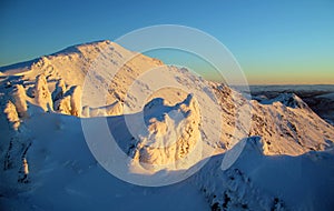 Sunrise glow, Snowscape, Crib Goch from Snowdon