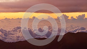 Sunrise at Haleakala volcano summit in Haleakala National Park, Maui, Hawaii, USA