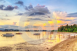 Sunrise at the harbor of Koh Kho Khao island photo