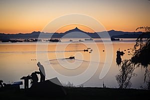 Sunrise in the harbour of Quellon in Chiloe Island. Patagonia in