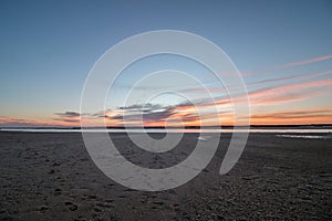 sunrise horizon line on a deserted beach