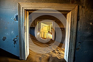 Sunrise inside an abandoned building in Kolmonskop Namibia