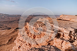 Sunrise in Israel dry negev desert. Amazing view on mountaines, rocks and sky. National park makhtesh ramon