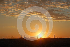 Sunrise in Istanbul (Turkey). Minarets and domes of mosques. Skyline photo