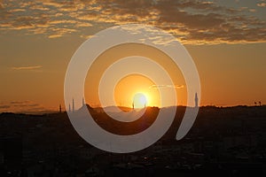 Sunrise in Istanbul (Turkey). Minarets and domes of mosques. Skyline photo