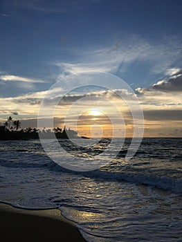 Sunrise in July in Wailua Bay on Kauai Island, Hawaii.