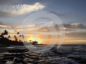 Sunrise in July in Wailua Bay on Kauai Island, Hawaii.