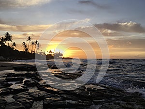 Sunrise in July in Wailua Bay on Kauai Island, Hawaii.