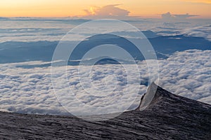 Sunrise landscape over horizon and clouds at Kota Kinabalu`s summit in Malaysia