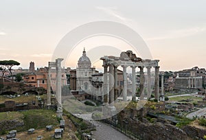 Sunrise landscapes of the empty Roman Forum, view of the Temple of Vespasian and Titus