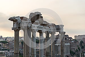 Sunrise landscapes of the empty Roman Forum, view of the Temple of Vespasian and Titus