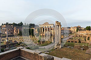 Sunrise landscapes of the empty Roman Forum, view of the Temple of Vespasian and Titus