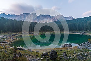 Sunrise landscapes in Lago di Carezza and Latemar Mountain in the background in Welschnofen, South Tyrol, Italy