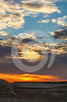 Sunrise in the Libyan desert  white desert  limestone formations in the front  Farafra  Egypt