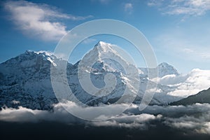 sunrise light over Annapurna mountain range with beautiful clouds, view from Poon hill in Himalayas, Nepal