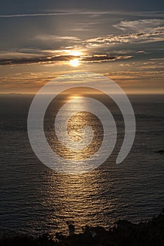 Sunrise with low clouds on Omaha Beach Normandy France