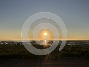 Sunrise during low tide at the Wadden Sea