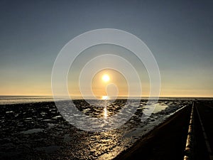 Sunrise during low tide at the Wadden Sea