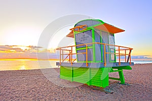 Sunrise in Miami Beach Florida, with a colorful lifeguard hous