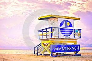 Sunrise in Miami Beach Florida, with a colorful lifeguard house