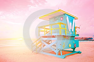 Sunrise in Miami Beach Florida, with a colorful lifeguard house