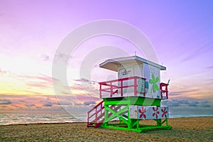 Sunrise in Miami Beach Florida, with a colorful lifeguard house