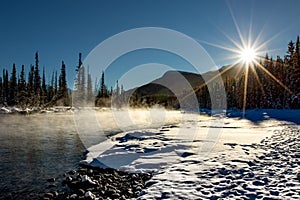 Sunrise at Misty Bow River on Winter Day