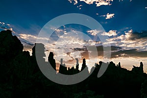 Sunrise at Mono Lake with silhouette tufa towers. Eastern Sierra Nevada Mountains of California