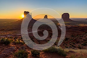 Sunrise at Monument Valley, Panorama of the Mitten Buttes - seen from the visitor center at the Navajo Tribal Park - Arizona and