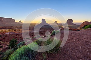 Sunrise at Monument Valley, Panorama of the Mitten Buttes - seen from the visitor center at the Navajo Tribal Park - Arizona and