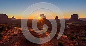 Sunrise at Monument Valley, Panorama of the Mitten Buttes - seen from the visitor center at the Navajo Tribal Park - Arizona and