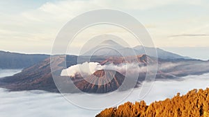 Sunrise at Mount Batok, Bromo Crater, and Mount Semeru in the distance