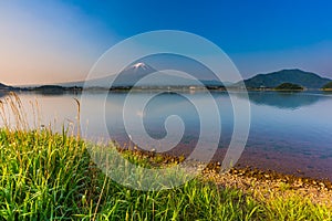 Sunrise at mount Fuji with reflection on lake kawaguchiko