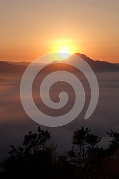 Sunrise on the mountain and sea of mist 