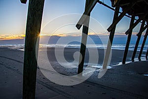 Sunrise Behind the Piling in Myrtle Beach