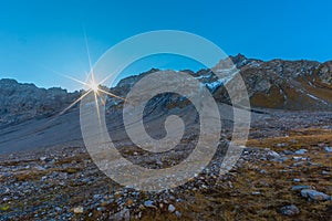 Sunrise near Erzhorn mountain peak near Arosa, Switzerland