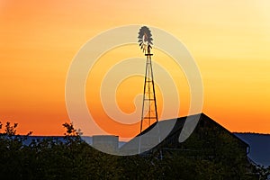 Sunrise on Old Barn and Windmill