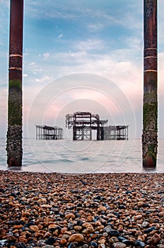 Sunrise at the old burnt out pier in brighton