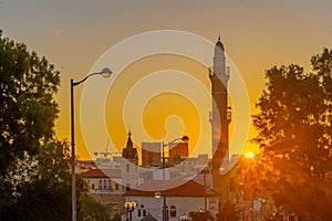 Sunrise in old Jaffa, clock tower and Mosque minaret