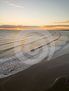 Sunrise over Alnmouth Beach, Northumberland, on the North East Coast of England.