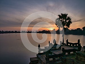 Sunrise over the ancient bathing pool of Sras Srang, part of the Angkor Archaeological Park near Siem Reap in Cambodia