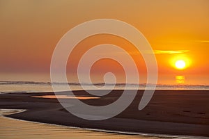 Sunrise over the beach and ocean at Corson's Inlet