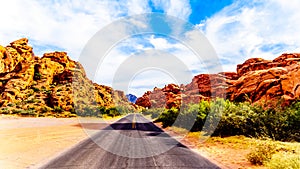 Sunrise over the bright red Aztec sandstone rock formations in the Valley of Fire State Park, NV, Usa