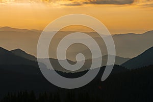 Sunrise over Carpathian mountain silhouette