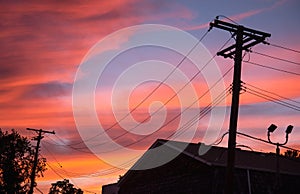 Sunrise Over City Power Lines