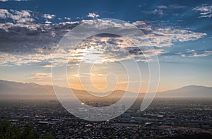 Sunrise over cityscape of Tucson Arizona viewed from Tumamoc Hill
