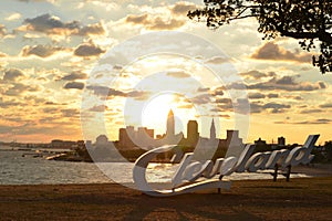 Sunrise over Cleveland sign and skyline at Lake Erie Edgewater park