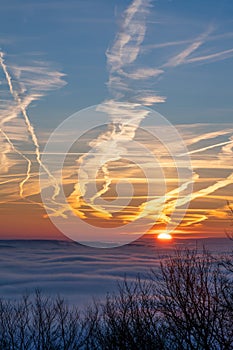 sunrise over a cloud inversion with vibrant colours