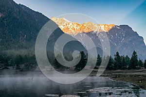 Sunrise over Dhikur Pokhari village, Kaski District, Annapurna circuit trek, Nepal