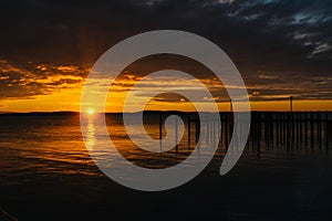 Sunrise over dock and the Chesapeake Bay, in Havre de Grace, Mar